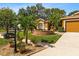 Charming house highlighting lush landscaping, a lovely fountain, and meticulous lawn care at 4508 Compass Oaks Dr, Valrico, FL 33596
