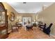 A comfortable living room offers tile floors, neutral paint, and french doors to the outdoor area at 4508 Compass Oaks Dr, Valrico, FL 33596