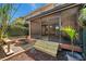 Screened porch leads to a backyard with a fire pit, creating a perfect blend of indoor-outdoor living at 4733 W Vasconia St, Tampa, FL 33629