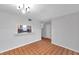 Dining room with tile flooring and a pass-through to the kitchen at 4733 W Vasconia St, Tampa, FL 33629