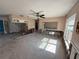 Sunlit living room featuring ceiling fan and window at 4911 Largo Ter, New Port Richey, FL 34652