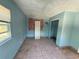 Room featuring one window with blinds at 4911 Largo Ter, New Port Richey, FL 34652