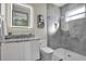 Modern bathroom featuring a glass-enclosed shower, sleek vanity, and contemporary fixtures for a luxurious feel at 511 45Th N Ave, St Petersburg, FL 33703