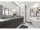 Modern bathroom featuring double sinks, a luxurious soaking tub, and contemporary lighting fixtures at 511 45Th N Ave, St Petersburg, FL 33703