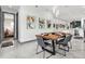 Chic dining area featuring a wooden table, modern chairs, and artwork on the wall at 511 45Th N Ave, St Petersburg, FL 33703