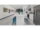 Contemporary kitchen with a large island, modern appliances, and open layout to other rooms at 511 45Th N Ave, St Petersburg, FL 33703