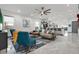 Bright and airy living room showcasing an open-concept design, with contemporary furnishings and seamless flow to the kitchen at 511 45Th N Ave, St Petersburg, FL 33703