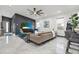 A modern living room featuring stylish furniture, white floors, recessed lighting, and neutral colors for a bright and airy feel at 511 45Th N Ave, St Petersburg, FL 33703