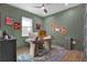 Cozy office with a modern desk, providing a functional workspace with natural light and stylish decor at 511 45Th N Ave, St Petersburg, FL 33703