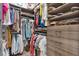 Organized walk-in closet with shelves, drawers, and hanging rods, maximizing storage space for clothing and accessories at 511 45Th N Ave, St Petersburg, FL 33703