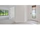 Hallway featuring a decorative glass front door at 5115 Tobermory Way, Bradenton, FL 34211