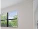 Window offering views of lush greenery and plenty of natural light at 5115 Tobermory Way, Bradenton, FL 34211