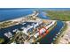 Stunning aerial of waterfront condos with boat docks and water views; unit location is circled in red at 525 Bahia Beach Blvd, Ruskin, FL 33570
