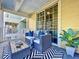 Outdoor condo patio with seating and views at 525 Bahia Beach Blvd, Ruskin, FL 33570