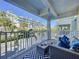Balcony with seating overlooking buildings and landscaping at 525 Bahia Beach Blvd, Ruskin, FL 33570