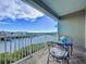 Balcony view with seating overlooks serene waterway and the neighborhood, offering relaxing scenery at 525 Bahia Beach Blvd, Ruskin, FL 33570