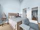 Bedroom with a queen bed and waterfront view at 525 Bahia Beach Blvd, Ruskin, FL 33570