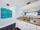 Modern kitchen showcasing stainless steel appliances and an open layout to the dining area at 525 Bahia Beach Blvd, Ruskin, FL 33570