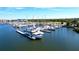 Scenic marina view filled with many boats docked along the piers with nearby waterfront condos at 525 Bahia Beach Blvd, Ruskin, FL 33570