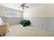 Cozy bedroom with a ceiling fan and window, ready for personalization at 571 Johns Pass Ave, Madeira Beach, FL 33708