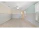 A spacious bedroom with great light and neutral wall colors at 571 Johns Pass Ave, Madeira Beach, FL 33708
