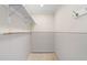 A walk in closet featuring high mounted shelving and clothes rod at 571 Johns Pass Ave, Madeira Beach, FL 33708