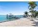This waterfront home has a private dock, boat lift, and patio, creating the perfect outdoor retreat at 571 Johns Pass Ave, Madeira Beach, FL 33708