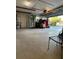 Spacious garage with ample storage space and an open layout at 571 Johns Pass Ave, Madeira Beach, FL 33708