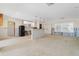 A spacious kitchen featuring an island with pendant lighting and modern appliances at 571 Johns Pass Ave, Madeira Beach, FL 33708