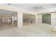 Spacious living room with visible ceilings, a ceiling fan, and an open layout, ideal for renovations at 571 Johns Pass Ave, Madeira Beach, FL 33708
