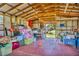 Large garage filled with storage items with the exterior visible from the open door at 5905 Caroline Dr, Wesley Chapel, FL 33545