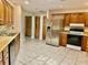 Spacious kitchen equipped with stainless steel appliances and ample counter space at 5905 Caroline Dr, Wesley Chapel, FL 33545