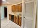 Functional kitchen featuring laminate counters and cabinetry at 5905 Caroline Dr, Wesley Chapel, FL 33545