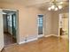 Inviting living room with access to a screened porch and bathroom, offering comfort and convenience at 5905 Caroline Dr, Wesley Chapel, FL 33545