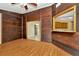 The cozy living room offers a pass through into the kitchen, connecting the spaces at 5905 Caroline Dr, Wesley Chapel, FL 33545