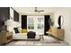 Bright main bedroom with a bed, side tables, and natural light from large windows, creating a relaxing retreat at 7730 Painted Sky Pl, Land O Lakes, FL 34637