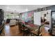 Large dining room with hardwood floors and access to kitchen and living areas at 8300 37Th N Ave, St Petersburg, FL 33710