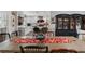 Open dining and kitchen area with an eat-in breakfast bar at 8300 37Th N Ave, St Petersburg, FL 33710