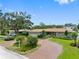Landscaped front of a house with brick driveway at 8300 37Th N Ave, St Petersburg, FL 33710