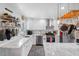 Bright kitchen featuring white cabinets, stainless steel appliances, and granite countertops at 8300 37Th N Ave, St Petersburg, FL 33710