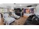 Open-concept living room with stylish decor and hardwood floors, flowing into the dining and kitchen at 8300 37Th N Ave, St Petersburg, FL 33710