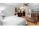Warm main bedroom featuring hardwood floors and classic furnishings at 8300 37Th N Ave, St Petersburg, FL 33710