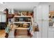 Well-organized pantry offers ample storage space with open shelving and white cabinets at 8300 37Th N Ave, St Petersburg, FL 33710
