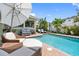 Enjoy this beautiful pool with lounge seating and lush landscaping at 8300 37Th N Ave, St Petersburg, FL 33710