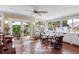 Cozy sunroom with travertine floors and backyard views at 8300 37Th N Ave, St Petersburg, FL 33710