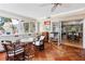 Sunroom featuring tile floors, bright windows, comfortable seating, and seamless transition to the main living area at 8300 37Th N Ave, St Petersburg, FL 33710