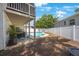 Backyard view of the house, patio, and pool at 921 Lynnlea Ln, Tarpon Springs, FL 34689