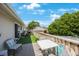 Upper balcony features outdoor seating and barbecue area at 921 Lynnlea Ln, Tarpon Springs, FL 34689
