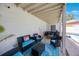 Covered patio featuring outdoor seating area and grill at 921 Lynnlea Ln, Tarpon Springs, FL 34689
