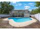 Backyard pool with large tanning deck, patio, and second story deck overlooking pool at 921 Lynnlea Ln, Tarpon Springs, FL 34689